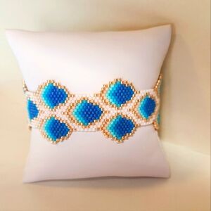 Shades of blue and gold "peacock feather" beaded bracelet - handmade by me